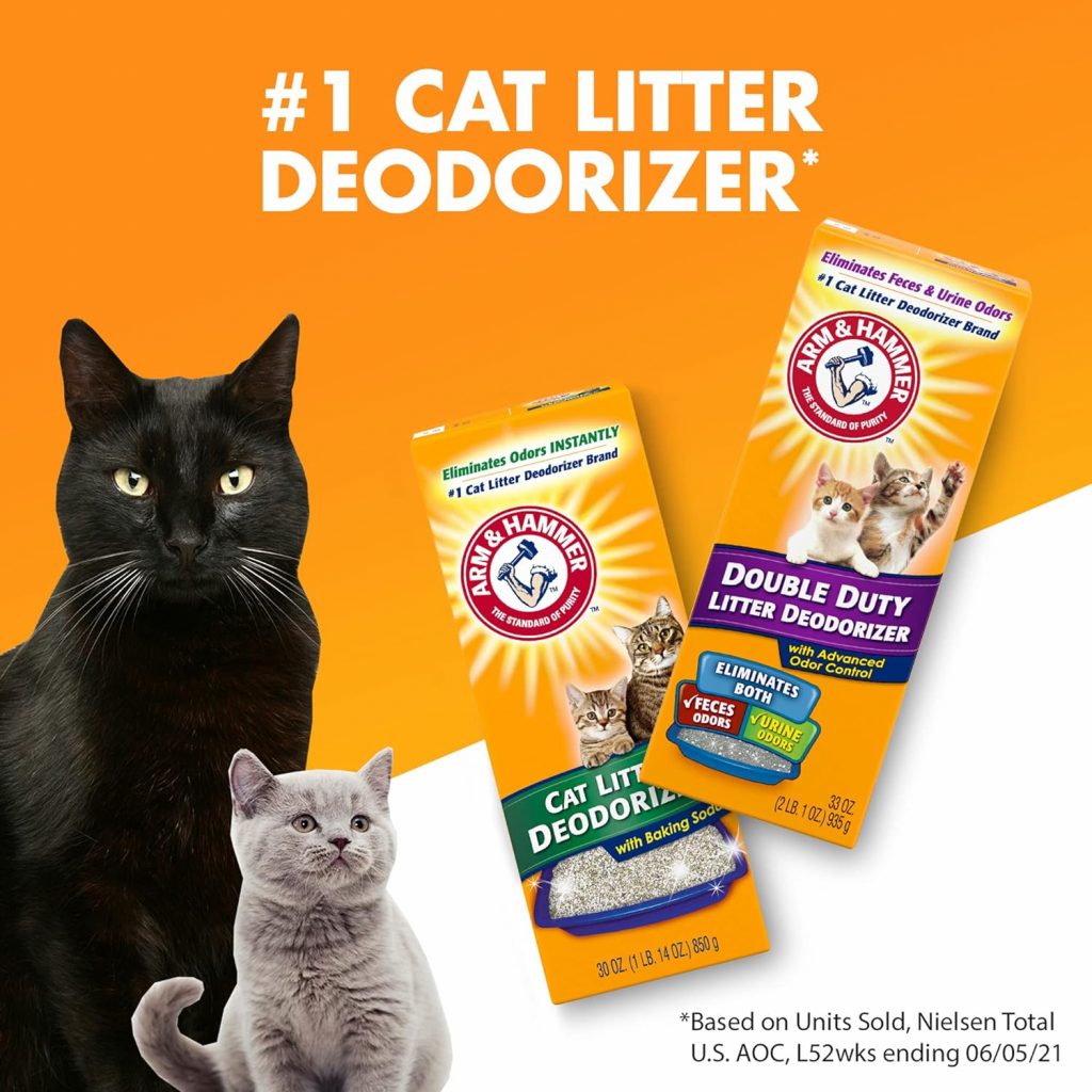 Two cats and Arm & Hammer cat litter deodorizer.